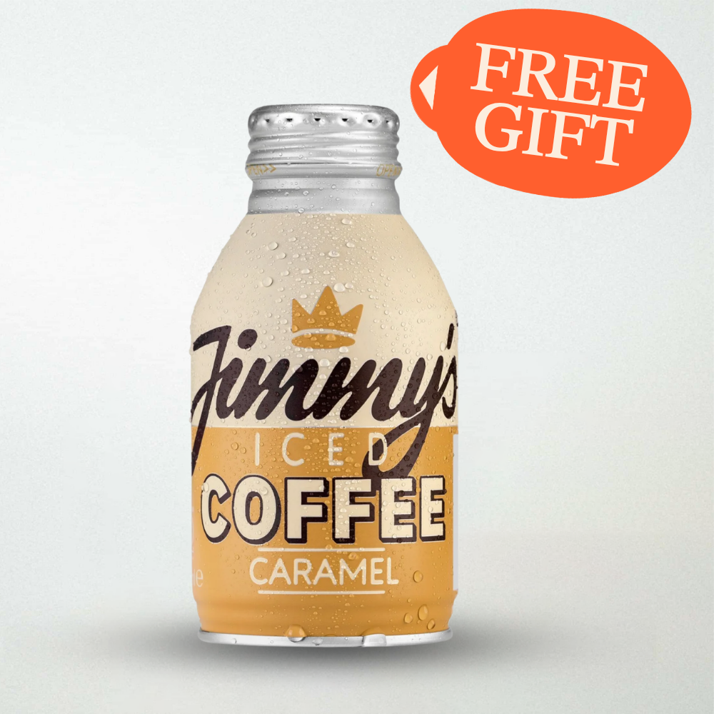 A bottle of Jimmy's Iced Coffee Caramel flavor with condensation droplets, featuring a silver cap and an orange 'FREE GIFT' badge in the top right corner.