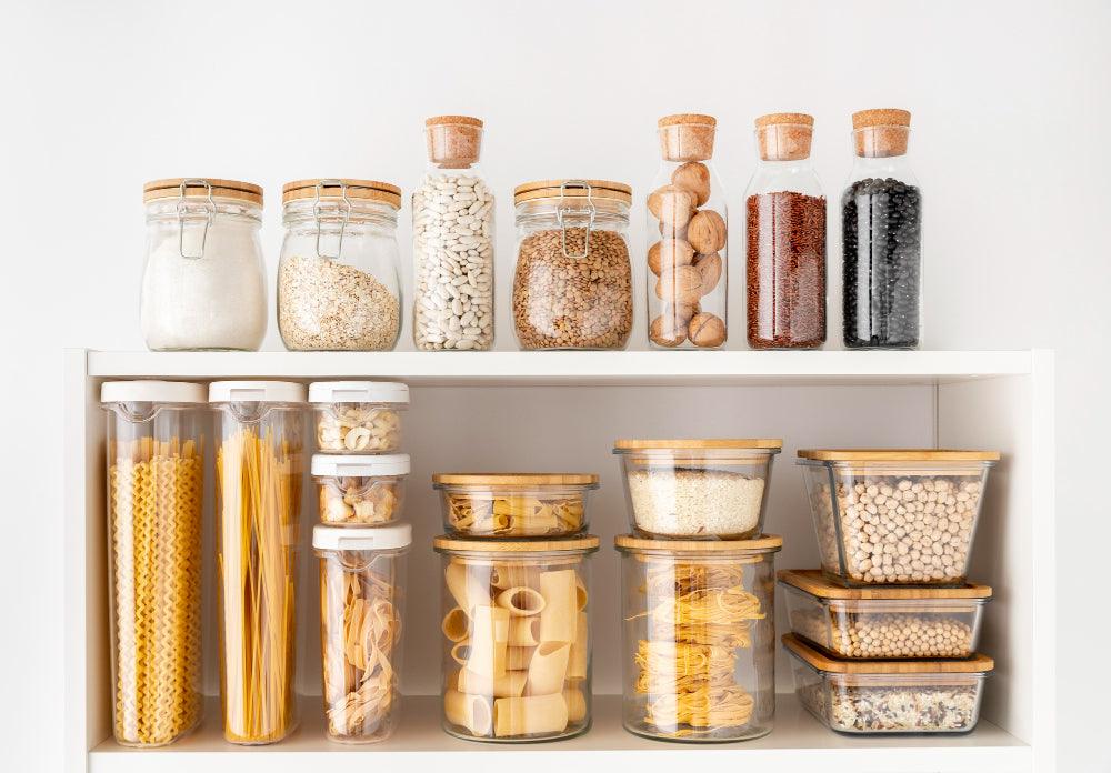 Glass jars filled with loose pantry ingredients.